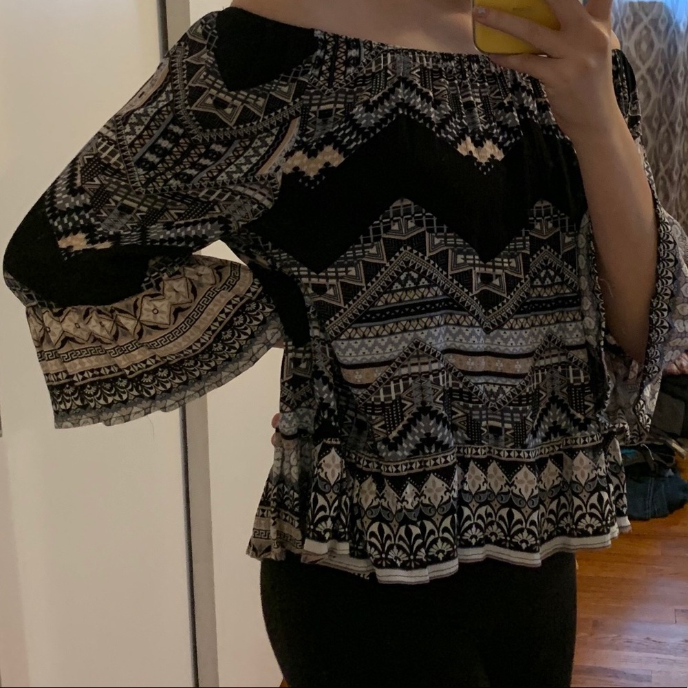 Off the shoulder shirt.